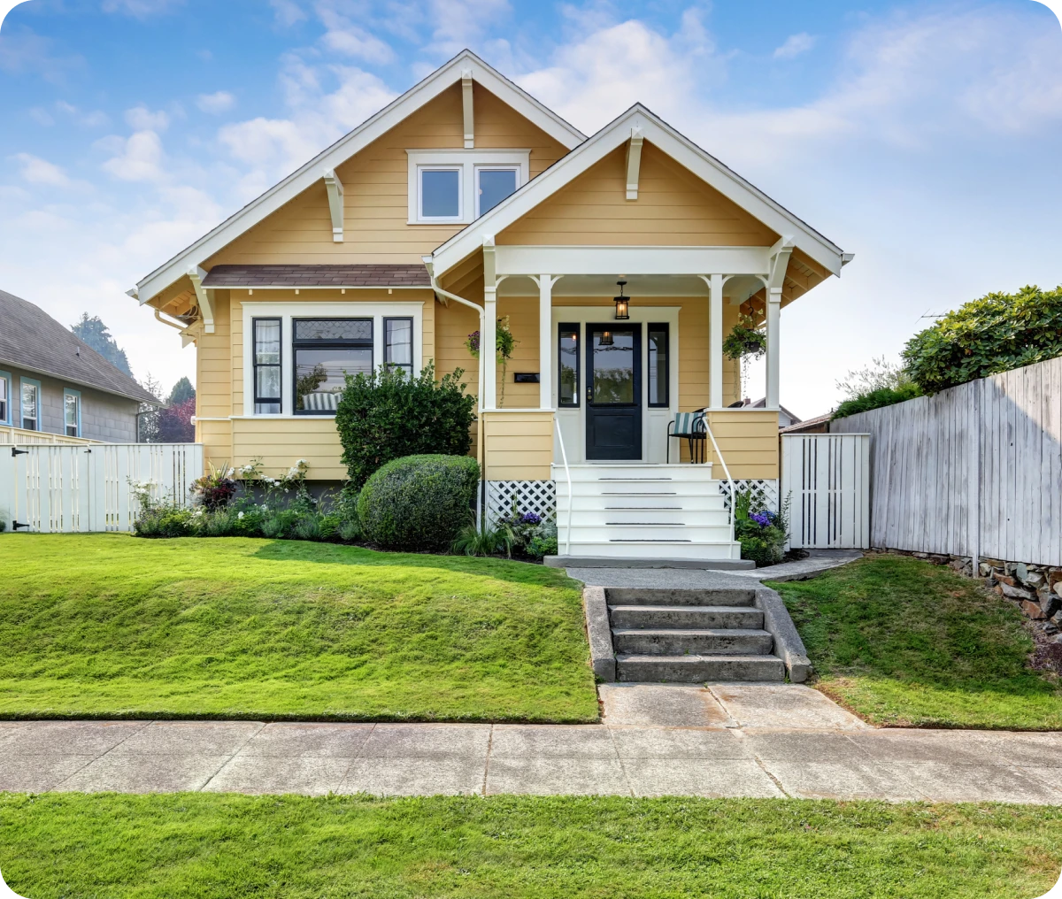 Yellow house with white trim