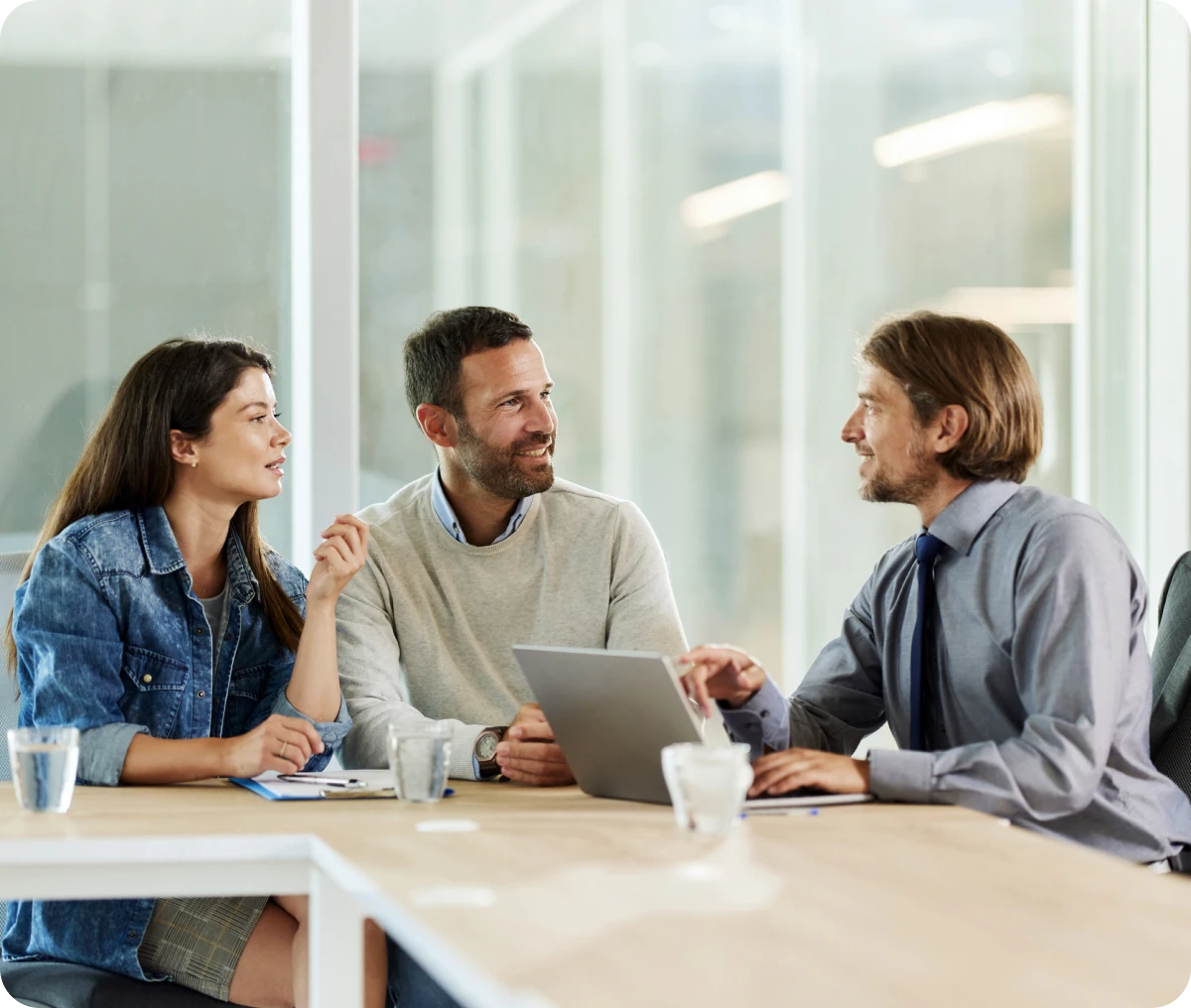 Business meeting with three colleagues
